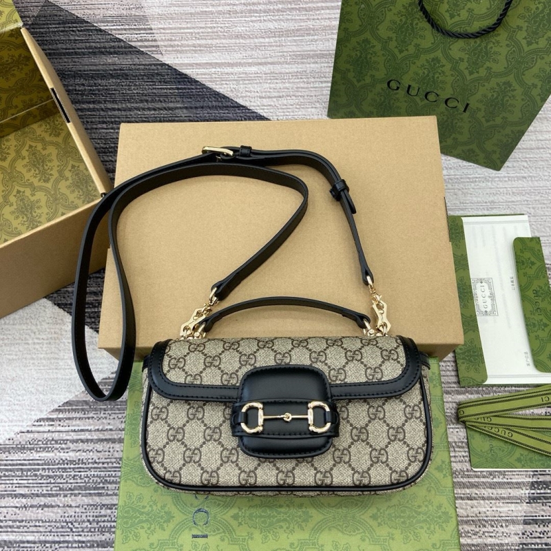 G*u*i top handle bags